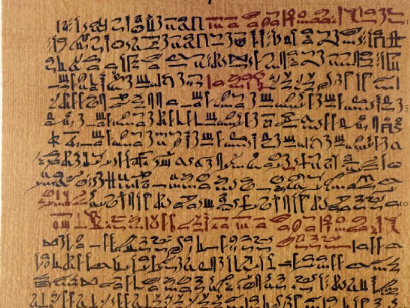 Papyrus Stone Hyper Content Ancient Papyrus Scroll Resting on a Stone Surface Representing Historical Writing Materials