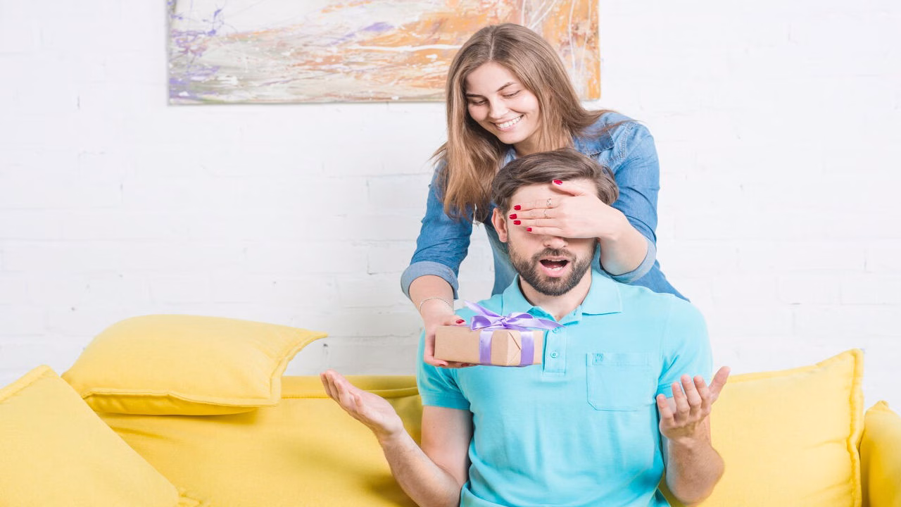 a Wife Giving Her Husband a Thoughtful Fathers Day Wish and Card