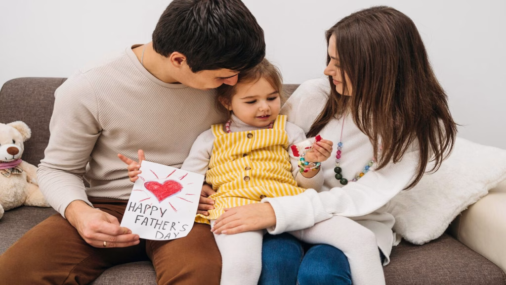 a Wife Giving Her Husband a Thoughtful Fathers Day Wish and Card