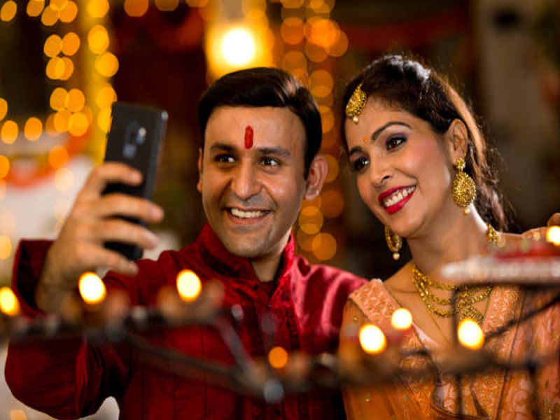 Happy Dussehra Wishes for Love Hyper Content Couple Celebrating Dussehra with Candles and Sweets