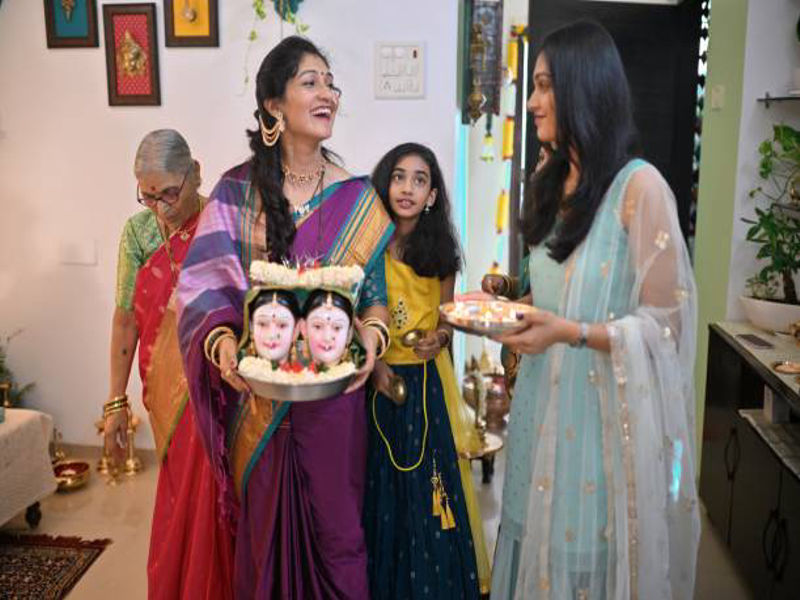 Happy Dussehra Wishes to Family Hyper Content Family Celebrating Dussehra with Traditional Clothes and Smiles